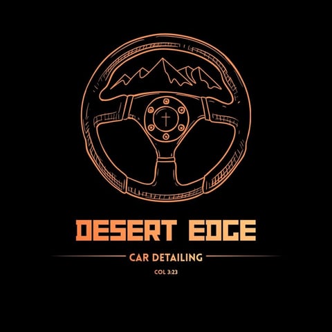 Desert Edge Car Detailing logo featuring an orange line-art steering wheel with mountains and cross symbol on black background